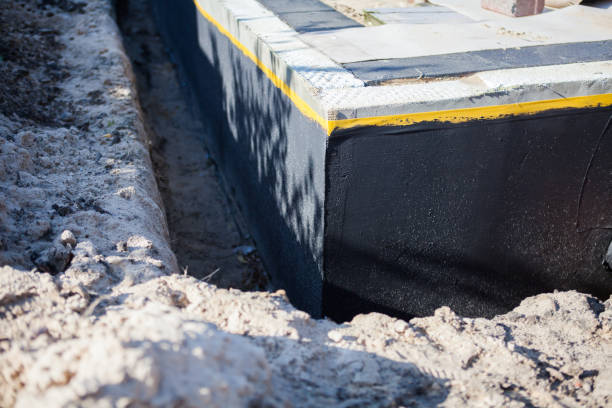 Professional Emergency Waterproofing technician working in Lancaster, OH